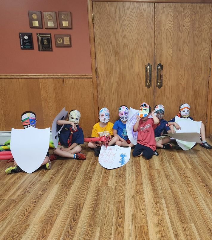 Cub Scouts Pack 1199 Den Meeting, cub scouts wearing paper masks they made during their meeting